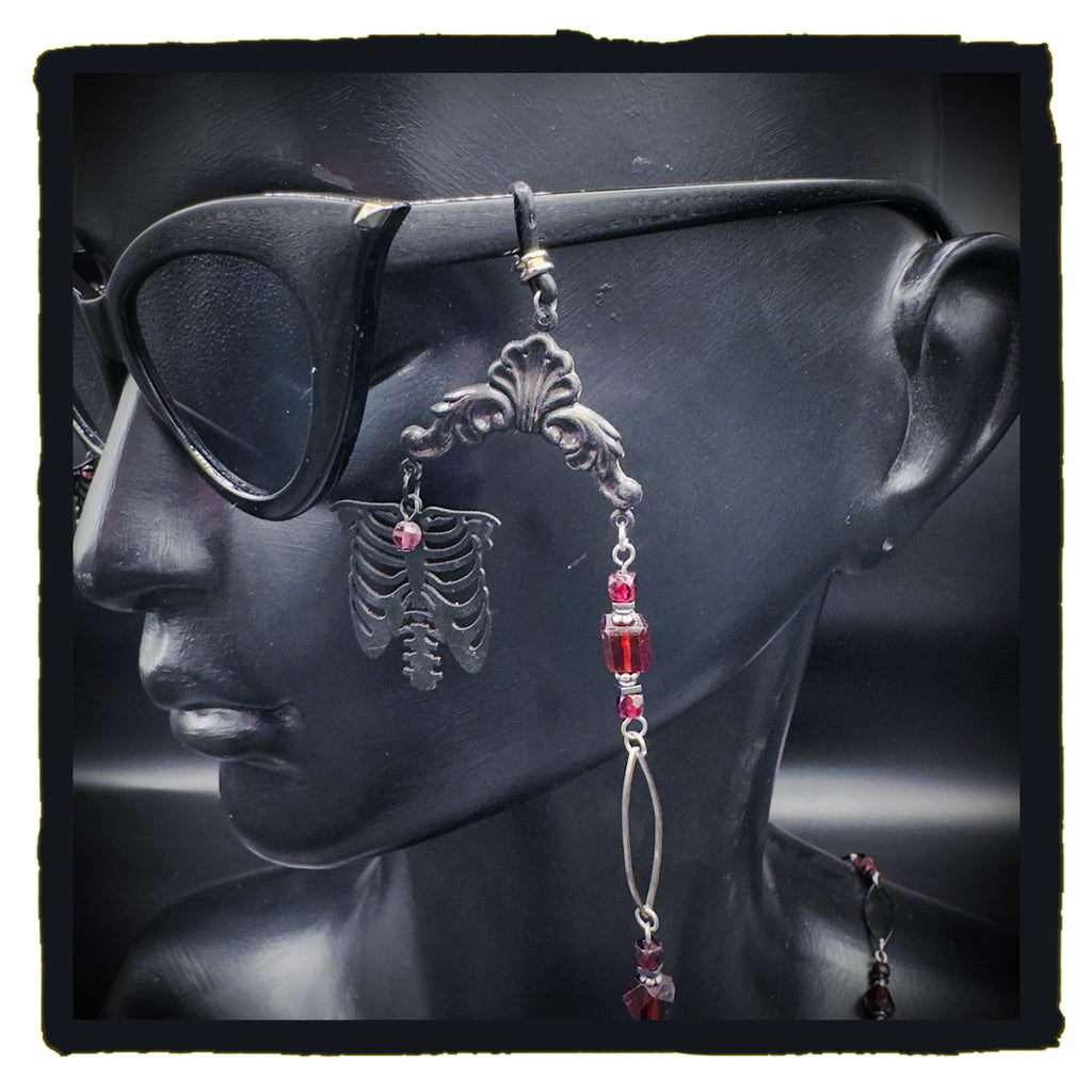 The Garnet in My Chest eyewear chain