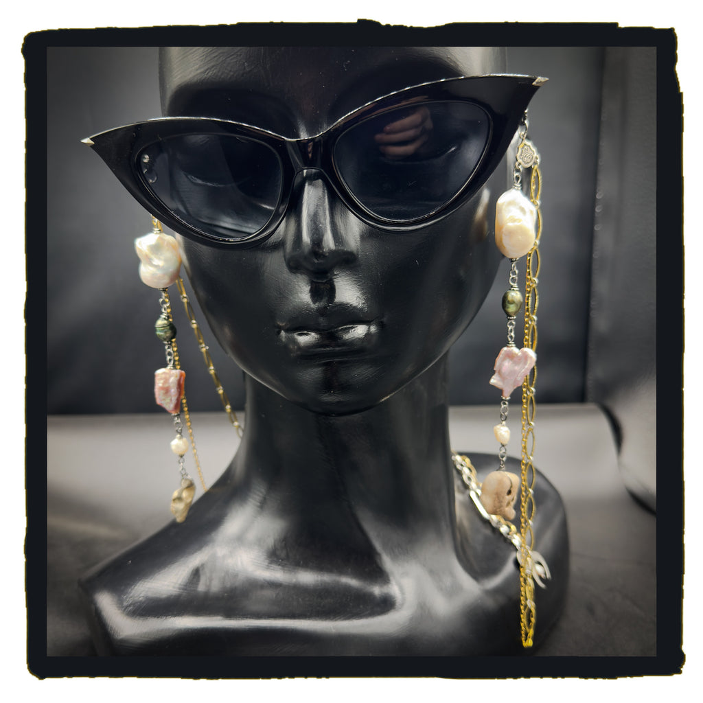 Pearl and Hag Stone eyewear chain