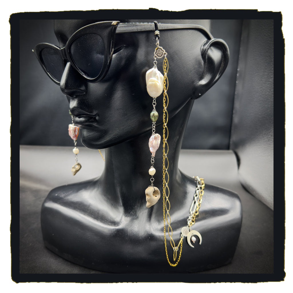 Pearl and Hag Stone eyewear chain