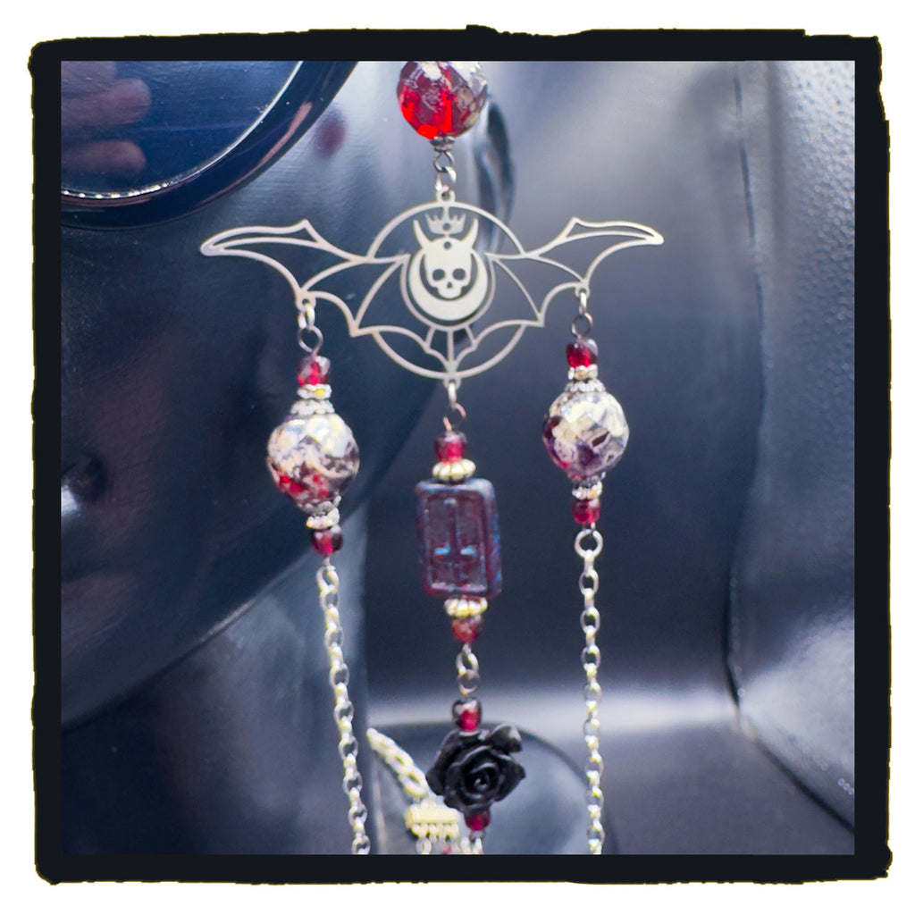 On The Devil’s Wings eyewear chain