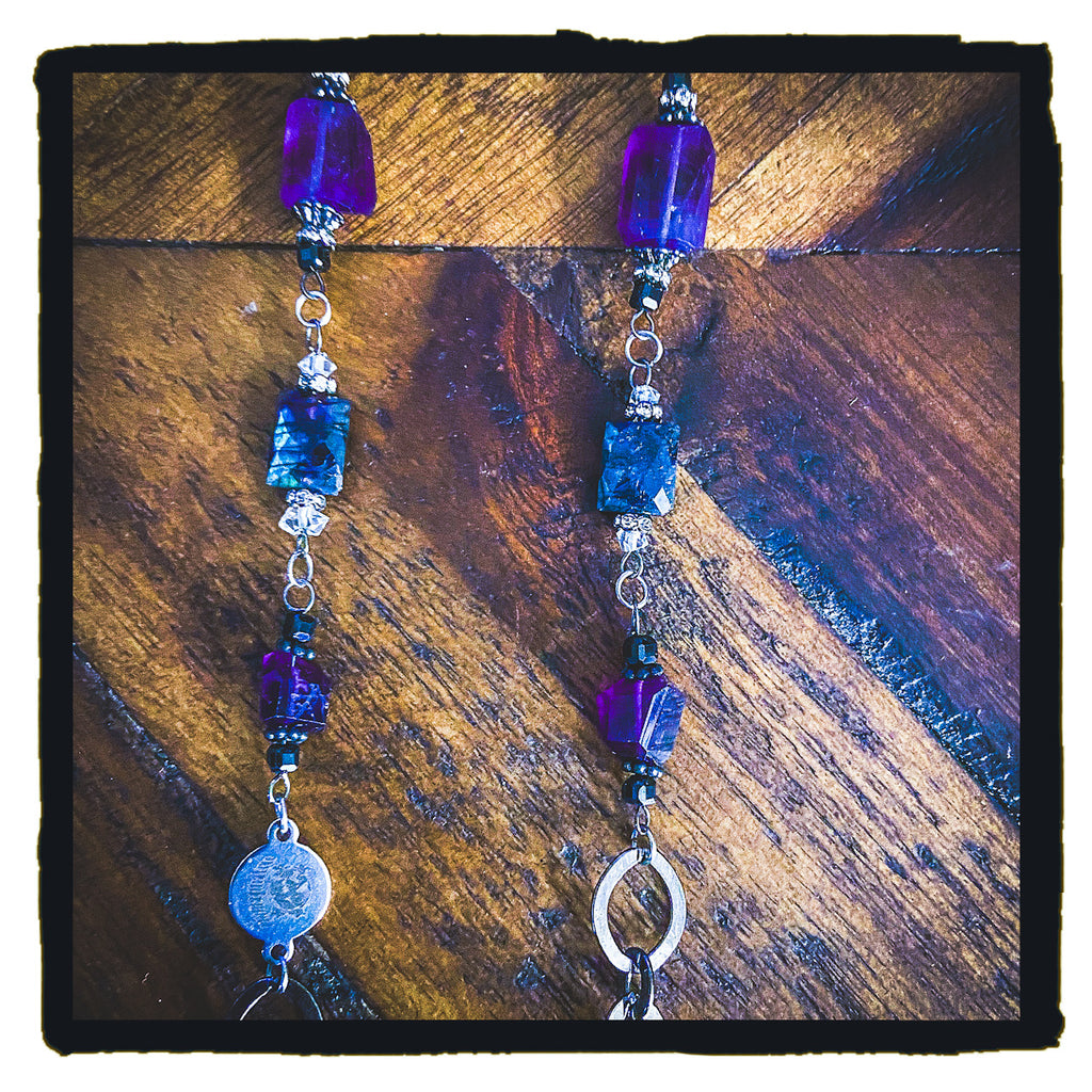 Night of the Scorpion eyewear chain