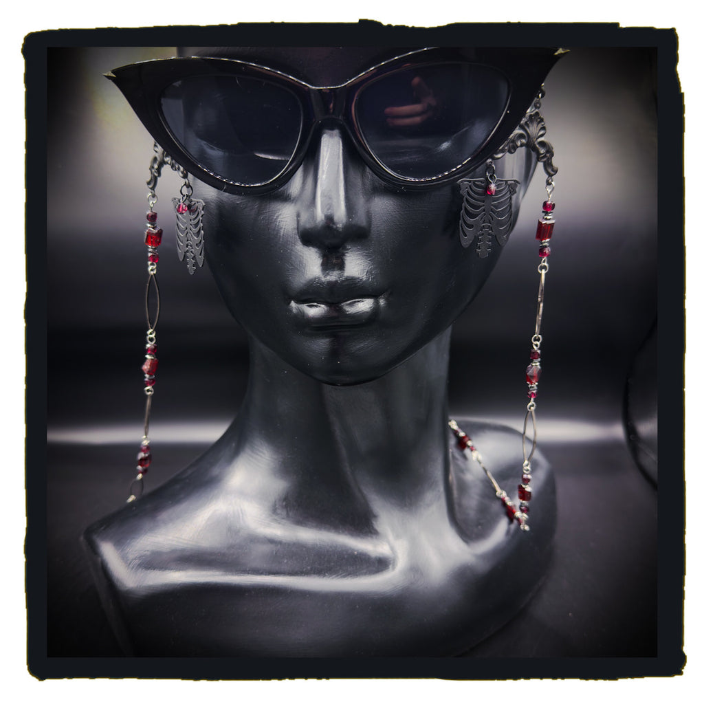 The Garnet in My Chest eyewear chain
