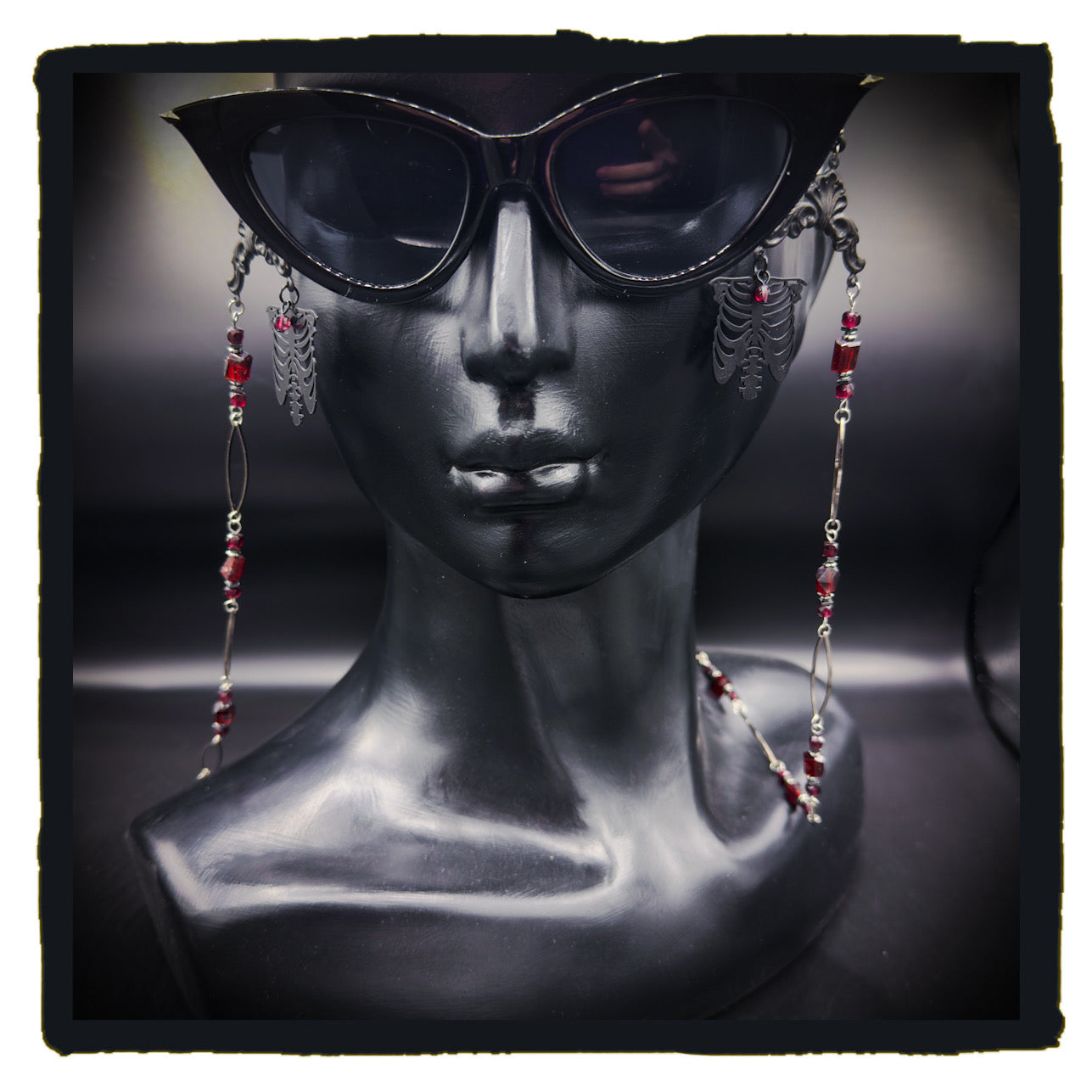 The Garnet in My Chest eyewear chain