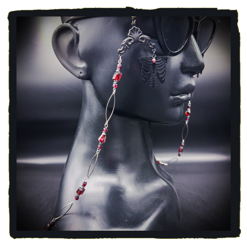 The Garnet in My Chest eyewear chain