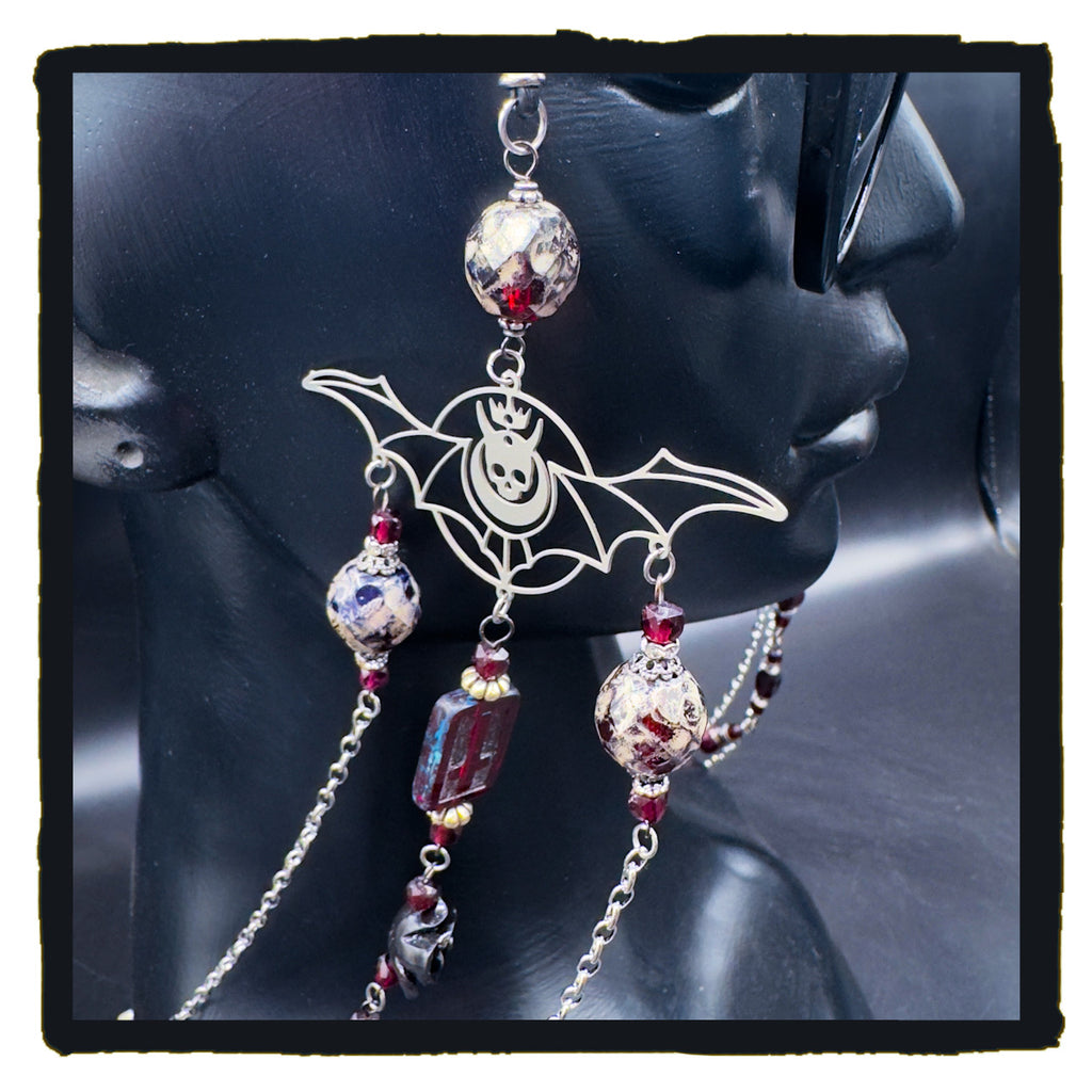 On The Devil’s Wings eyewear chain