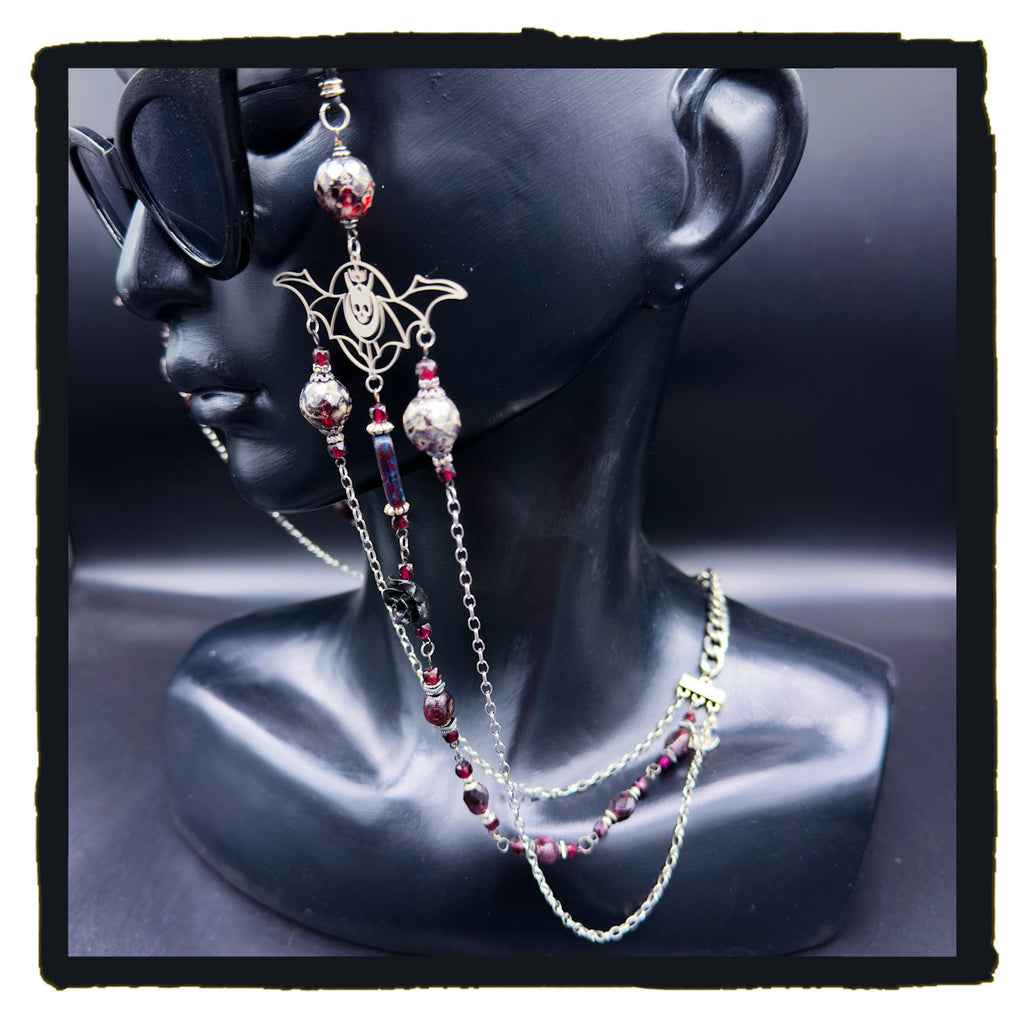 On The Devil’s Wings eyewear chain