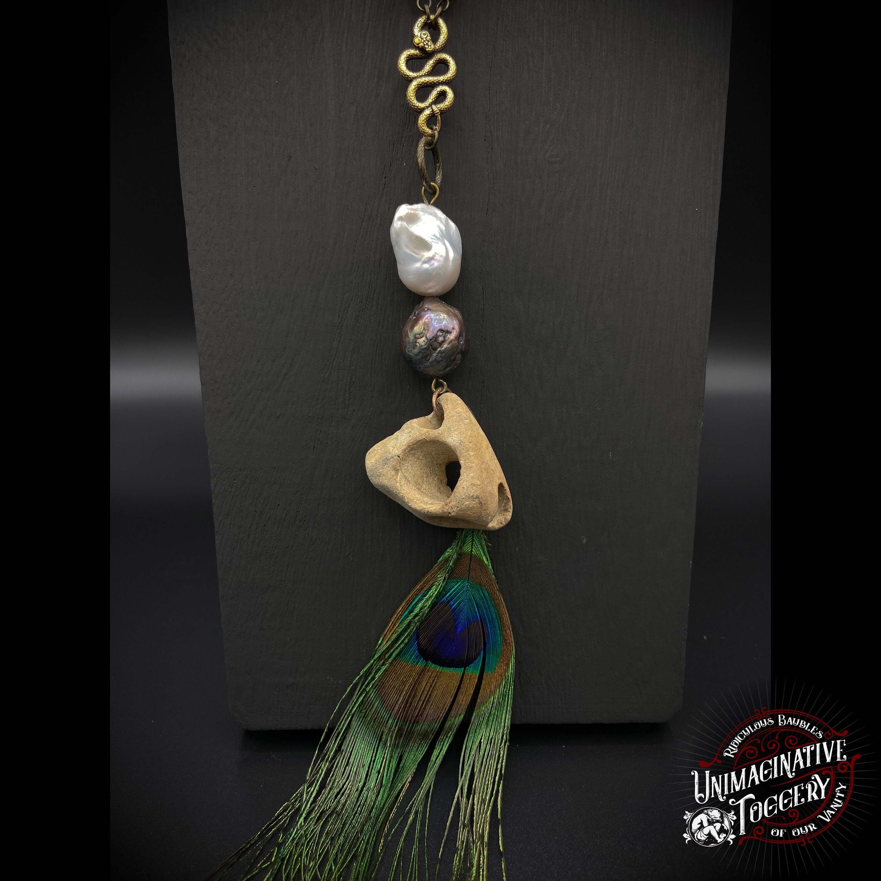 The snake and the peacock - Unimaginative By Charli Siebert
